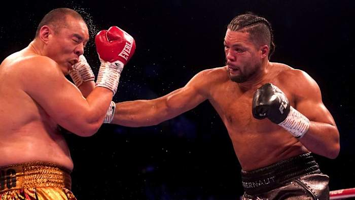 Joe Joyce (right) in action against Zhilei Zhang during their WBO Interim World Heavyweight fight at the Copper Box Arena, London in April 2023. The two are set to face each other in a rematch at the OVO Arena in London on the night of Saturday 23rd September. ADAM DAVY/PA IMAGES VIA GETTY IMAGES.